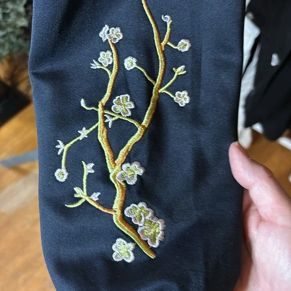 NWT Holly Bracken navy blue bomber with a cherry blossom design, size small - Picture 6 of 6